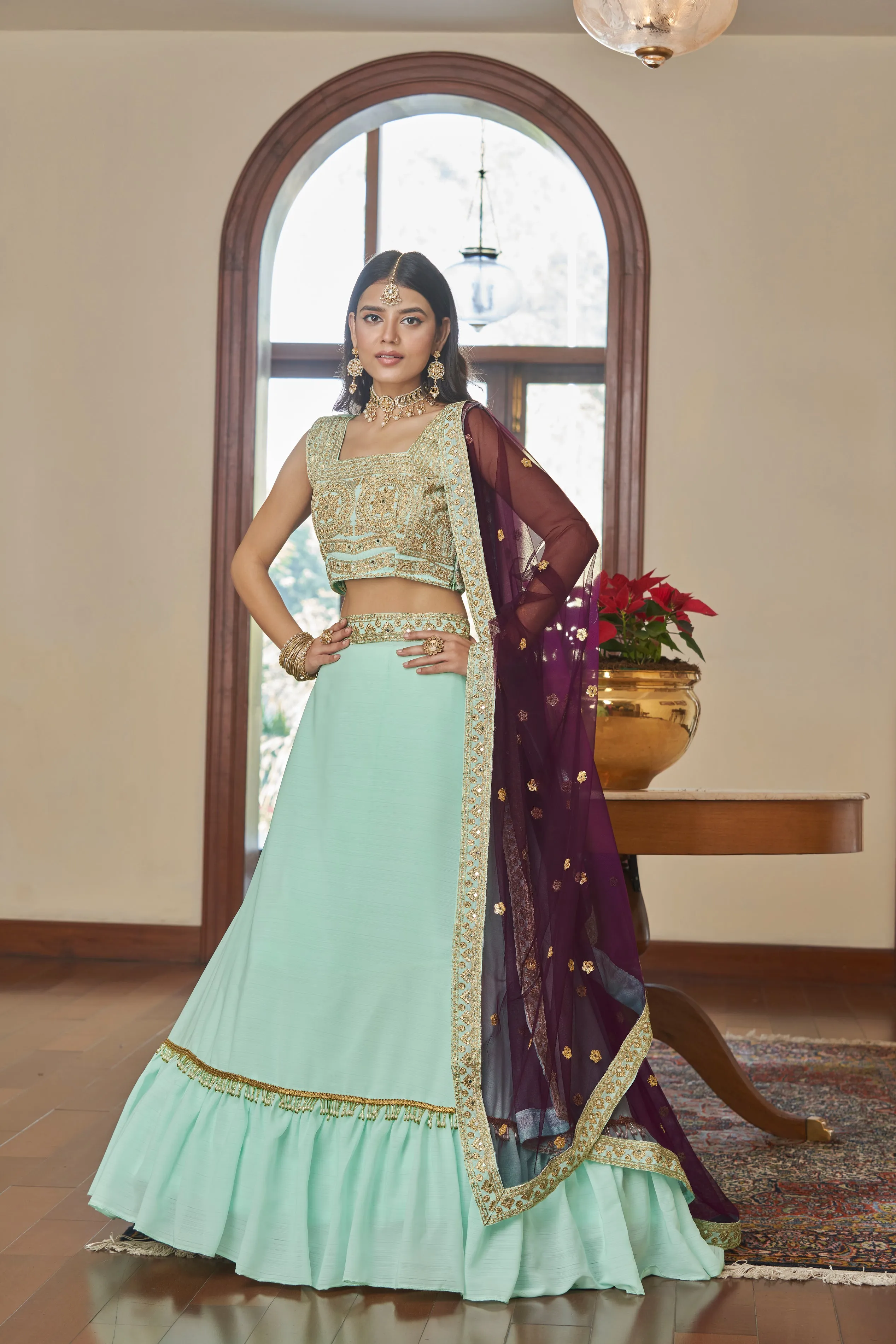 Aqua Blue Titan Silk Dori, Mirror, Zari & Sequins Embroidered Lehenga Choli Set with Butterfly Net Dupatta