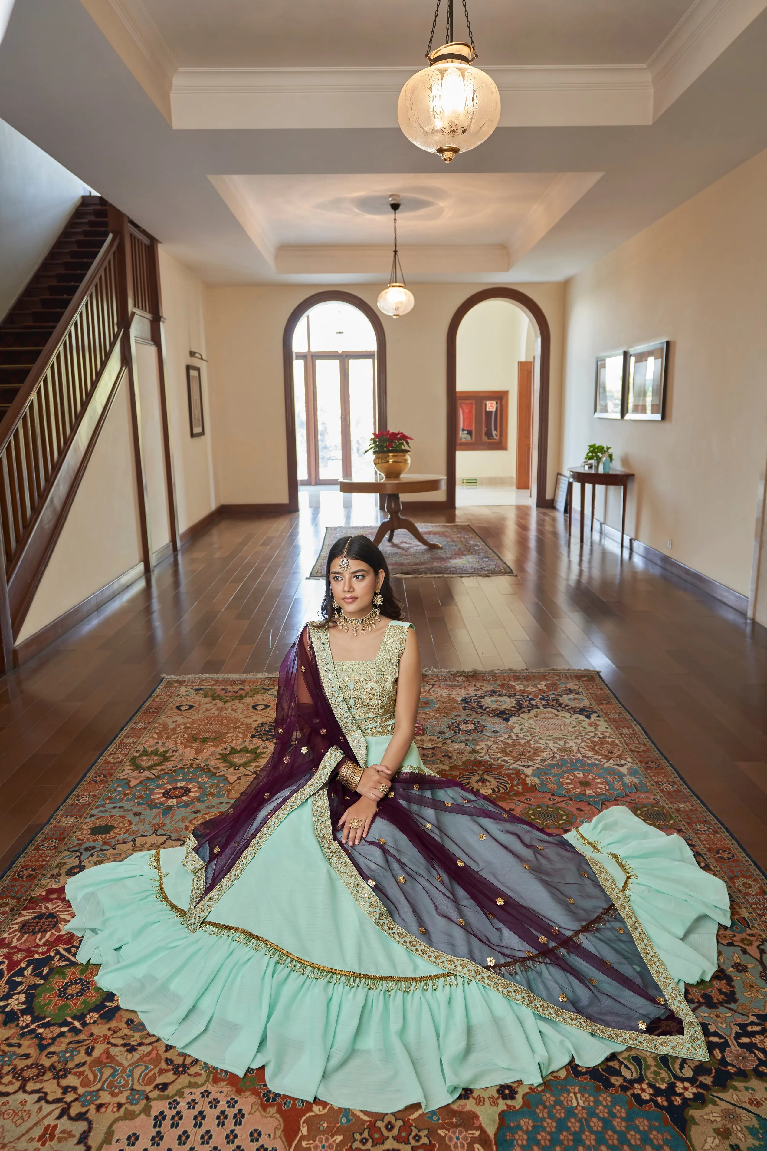 Aqua Blue Titan Silk Dori, Mirror, Zari & Sequins Embroidered Lehenga Choli Set with Butterfly Net Dupatta