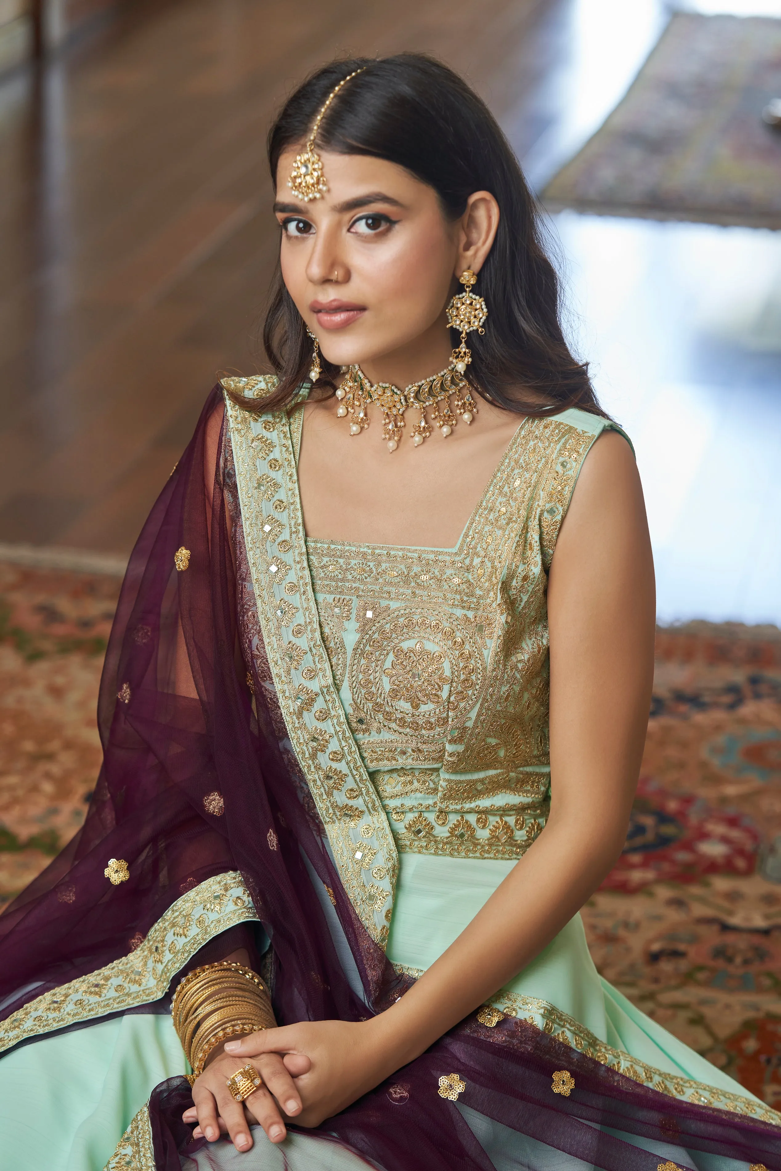 Aqua Blue Titan Silk Dori, Mirror, Zari & Sequins Embroidered Lehenga Choli Set with Butterfly Net Dupatta