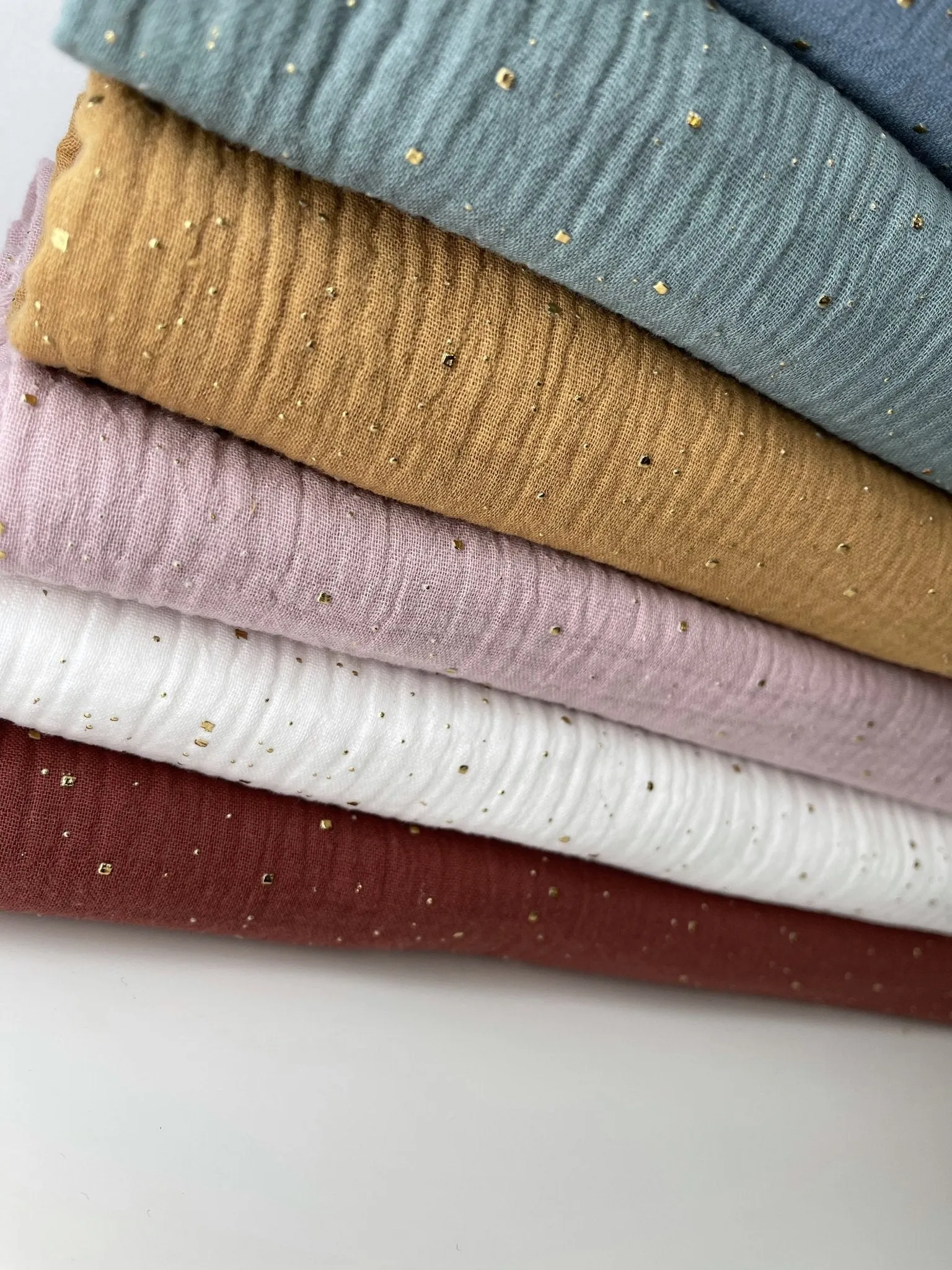 Double layered gauze muslin fabric with  gold stone drops studs